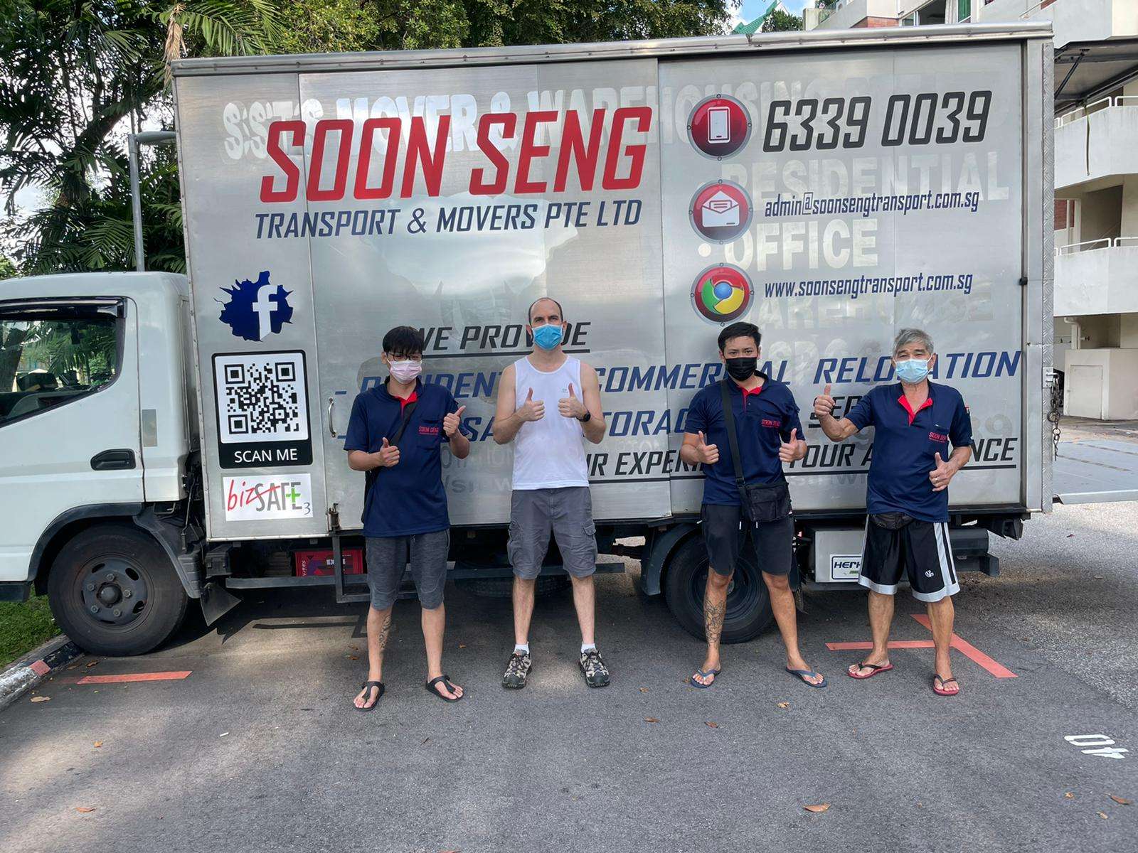 Soon Seng Transport and Movers Truck with 4 Male Drivers showing the thumbs up sign